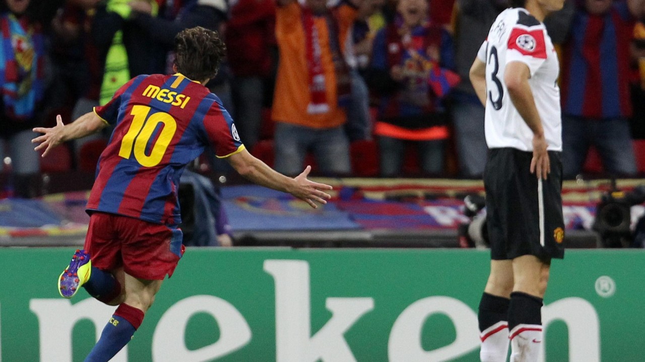 Lionel Messi celebrates his goal in the 2011 Champions League final at Wembley as a Manchester United player looks away